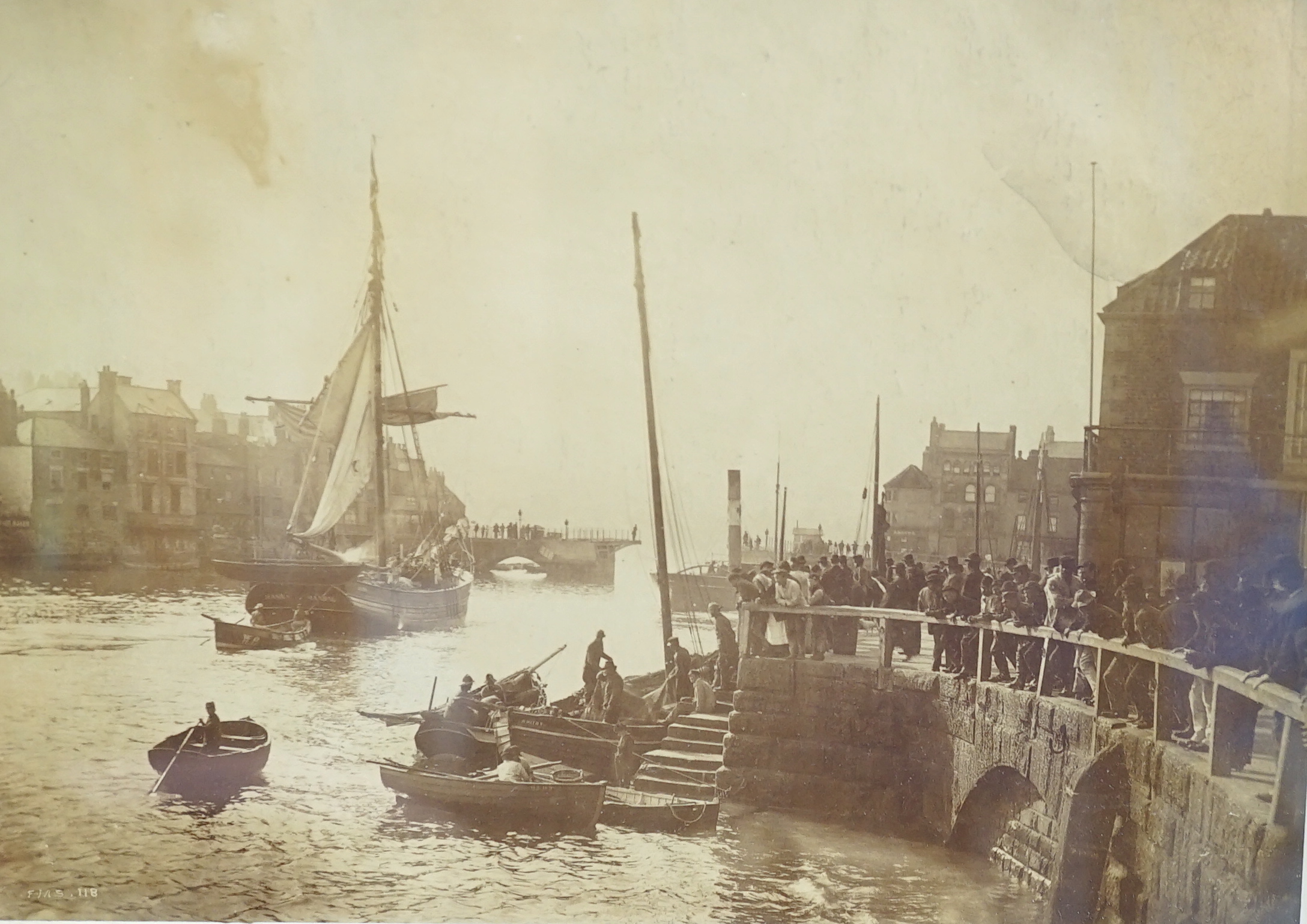 Francis (Frank) Meadow Sutcliffe (1853-1901), four black and white photographs, 'Views of Whitby' c.1875, and study of a fisherman, largest 20 x 29cm